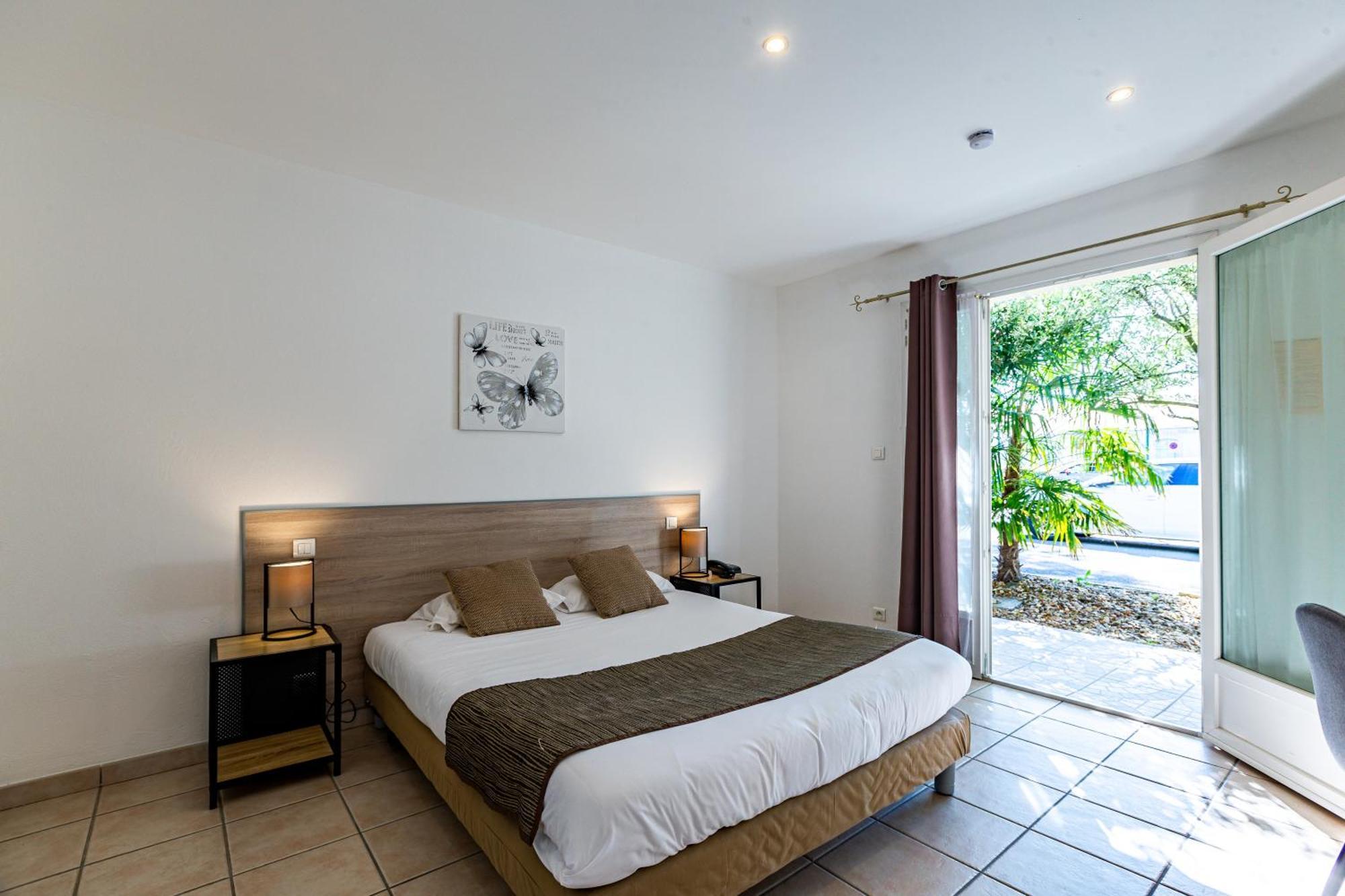 Logis Hotel L'Oliveraie Коняк Екстериор снимка